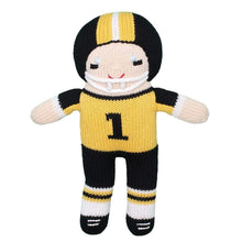 Load image into Gallery viewer, Football Player Knit Rattle - Gold &amp; Black
